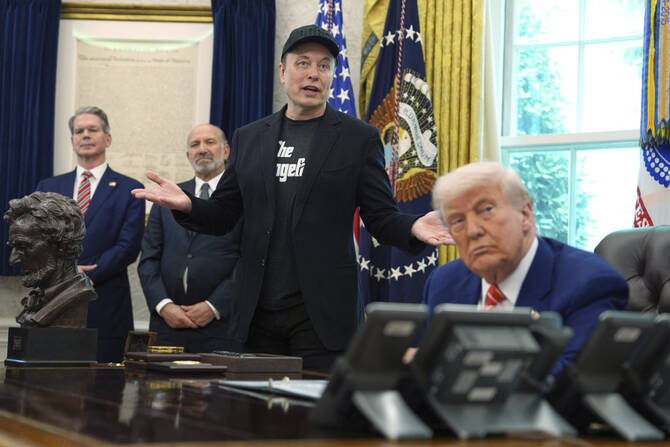 President Donald Trump, from right, speaks during a news conference with Elon Musk as Commerce Secretary Howard Lutnick and Treasury Secretary Scott Bessent listen in the Oval Office of the White House on May 30, 2025, in Washington. (AP Photo)
