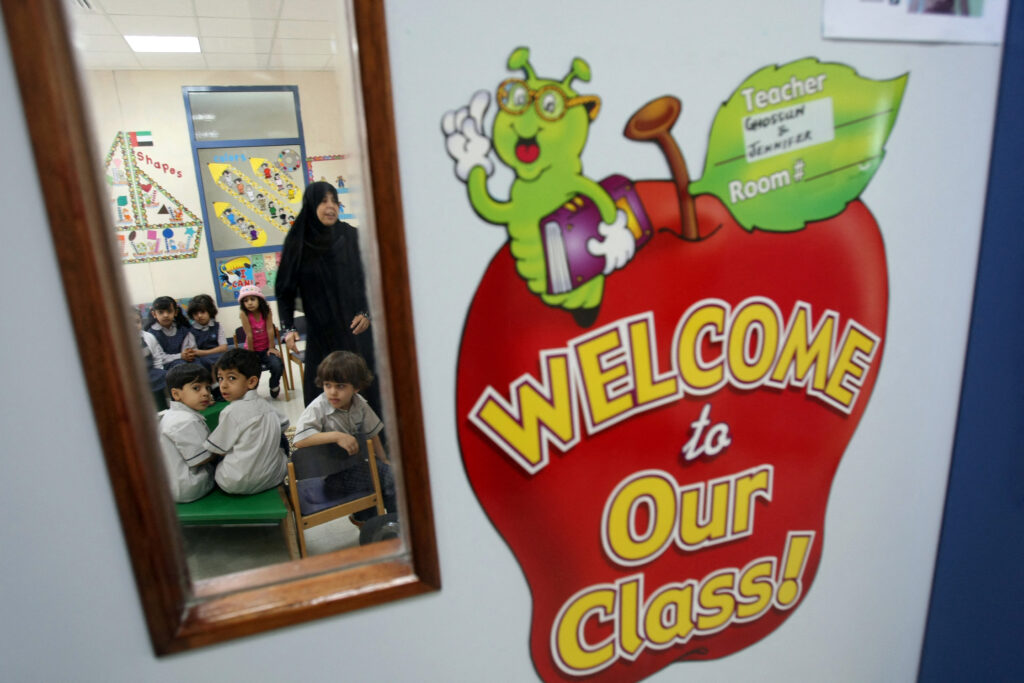 Children sit in their classroom on the first day of the public schools academic year in Dubai. (AFP)