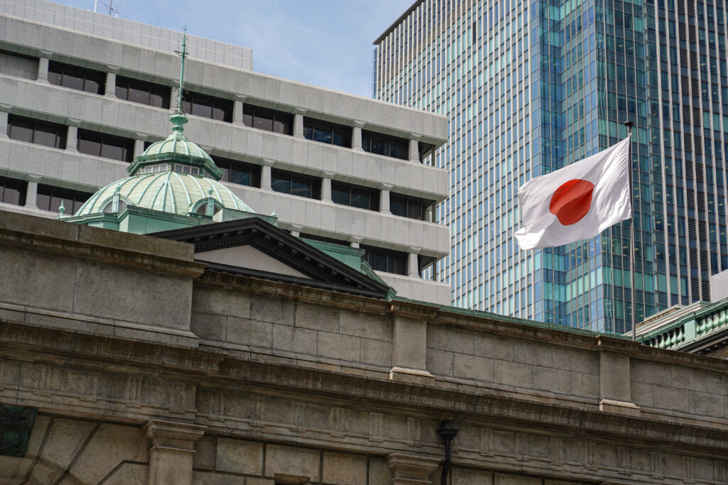 Japan's underlying inflation will stay around the BOJ's 2% target if there is an economic rebound, Uchida told parliament. (AFP)