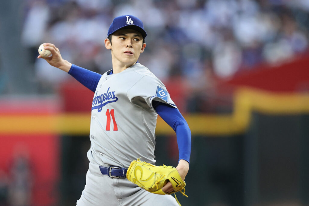 Starting pitcher Roki Sasaki #11 of the Los Angeles Dodgers pitches against the Los Angeles Dodgers during the MLB game at Chase Field on May 09, 2025 in Phoenix, Arizona. (AFP)