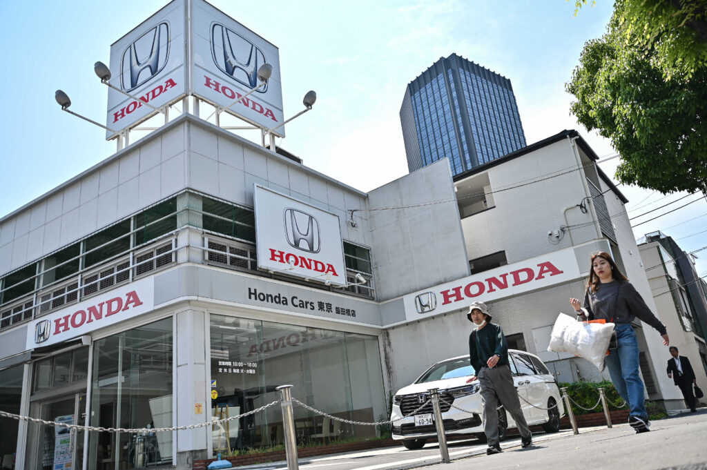 It plans to launch 13 next-generation hybrid models globally in the four years from 2027. (AFP)