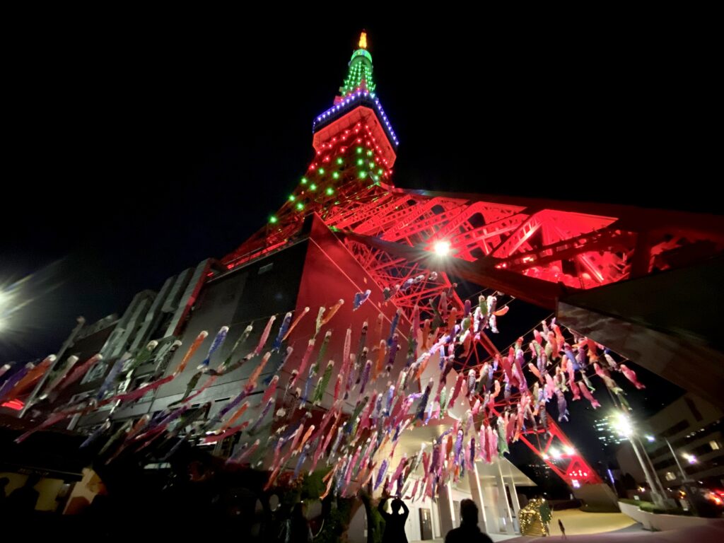 Koinobori or 'carp streamer,' carp-shaped windsocks traditionally flown in Japan to celebrate Children's Day, seen at the base of Tokyo Tower. (ANJ)