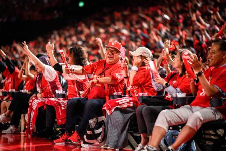 Spectators react during the B1 League basketball game between Chiba Jets and Sendai 89ers in Funabashi, Chiba Prefecture, east of Tokyo on May 4, 2025. (AFP)