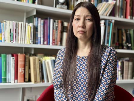 Sachi Schmidt-Hori, a Japanese literature and culture professor who was a consultant on the Assassin's Creed Shadows video game, poses for a portrait in her office at Dartmouth College in Hanover, New Hampshire, on April 2, 2025. (AP)