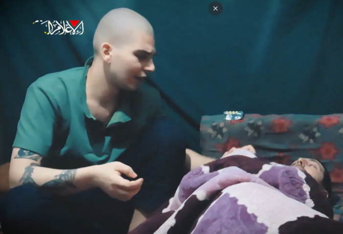 A screengrab taken from a three-minute video released by Hamas showing two Israeli hostages alive in the Gaza Strip, with one of the two men calling to end the 19-month-long war. (X/@clashreport)