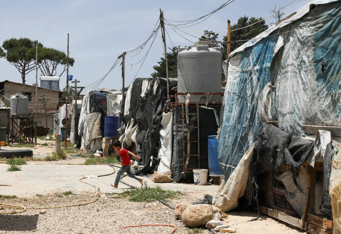 Syrian refugees in Lebanon, among millions of people around the world, are affected by US President Donald Trump's decision to freeze USAID funding to humanitarian programs. (Reuters/File)