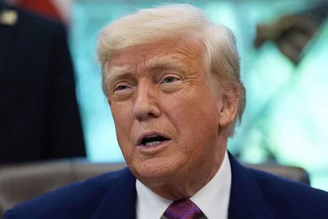 President Donald Trump speaks with reporters as he signs an executive order in the Oval Office of the White House, Friday, May 9, 2025. (AP)