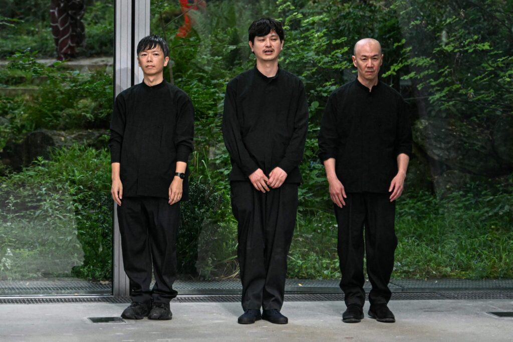 Designers aknowledge the audience at the end of the Issey Miyake fashion show for the Menswear Ready-to-wear Spring-Summer 2026 collection as part of the Paris Fashion Week in Paris, on June 26, 2025. (AFP)