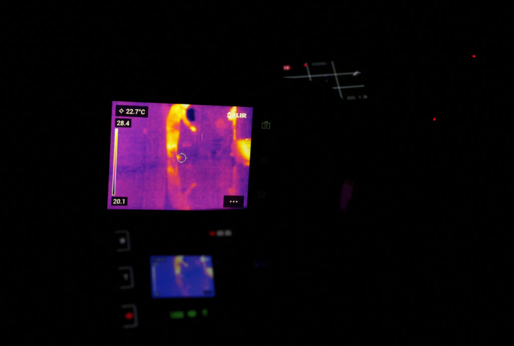 A thermal image image on a video camera is pictured while real estate consultant Kazutoshi Kodama conducts a 'ghost investigation' at a house, in Chiba Prefecture. (Reuters)