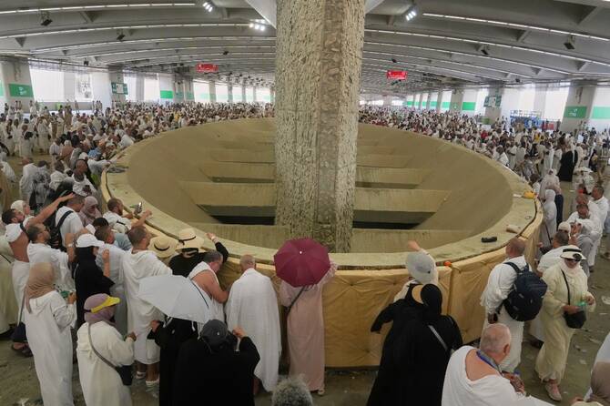 Muslim pilgrims cast stones at pillars in the symbolic stoning of the devil, the last rite of the annual Hajj, in Mina near the holy city of Makkah, Saudi Arabia, Friday, June 6, 2025. (AP)