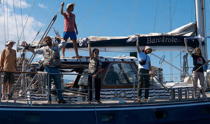 Activist Greta Thunberg and crew stand aboard the aid ship Madleen, which left the Italian port of Catania on June 1 to travel to Gaza to deliver humanitarian aid, in this picture released on June 2, 2025 on social media. (Reuters)