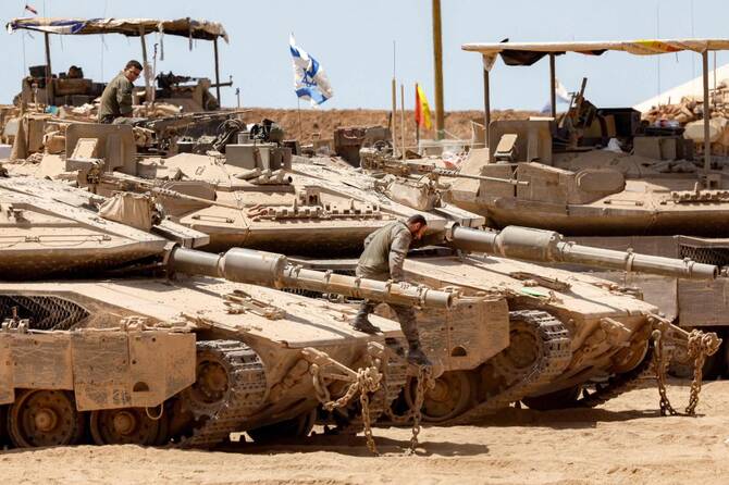 Israel said on Tuesday it hit weapons belonging to the government in retaliation for the firing of two projectiles toward Israel for the first time under the country’s new leadership. (AFP)