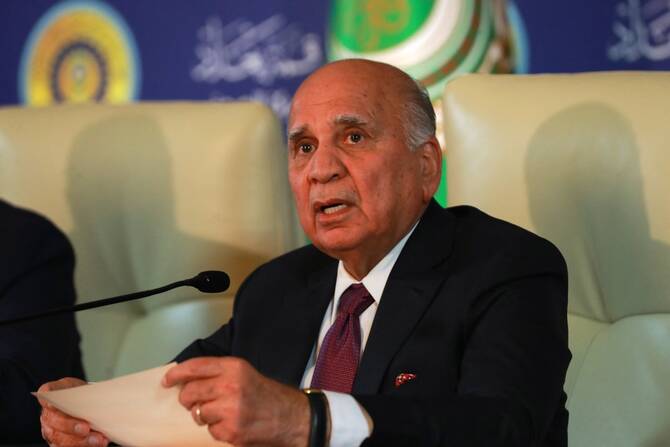 Iraqi Foreign Minister Fuad Hussein delivers a speech during the 34th Arab League summit in Baghdad, May 17, 2025. (AFP)