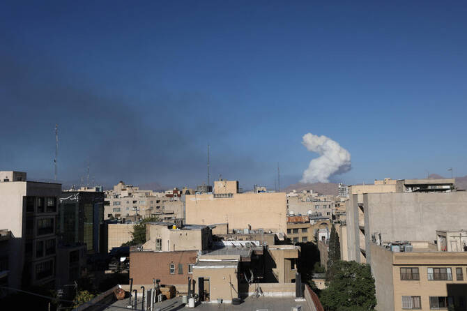 Smoke rises following an Israeli attack in Tehran, Iran ON June 18, 2025. (WANA via Reuters)
