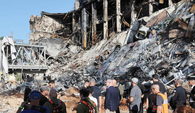 Israel's PM Benjamin Netanyahu visits the site of the Weizmann Institute of Science, which was hit by an Iranian missile barrage, in Rehovot on June 20, 2025. (AFP)