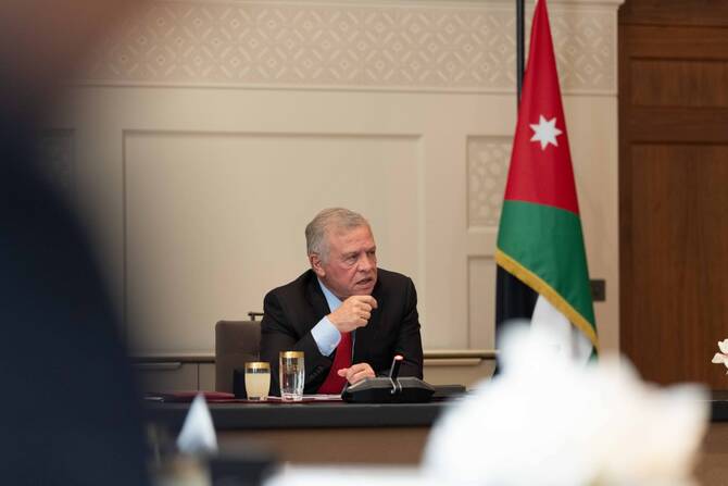  King Abdullah II of Jordan chairing a meeting on Sunday with officials and security agencies. (Petra)