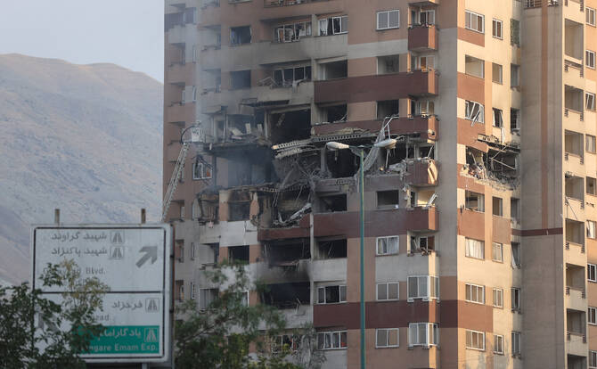 A building stands damaged in the aftermath of the Israeli strikes on Tehran on June 13, 2025. (Reuters)