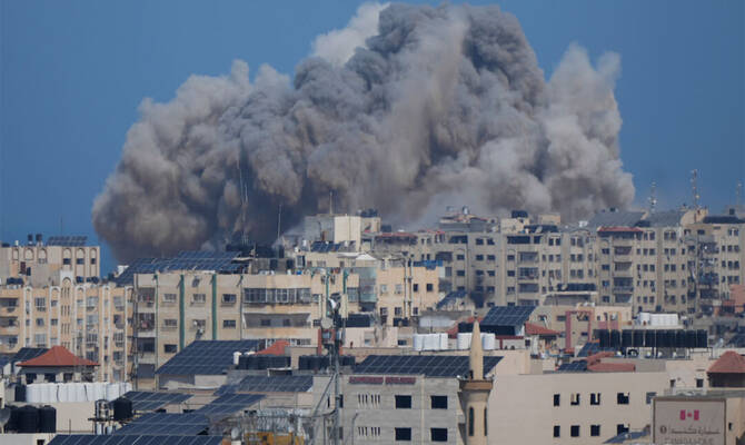 Smoke rises following an Israeli airstrike in Gaza City. (AP)