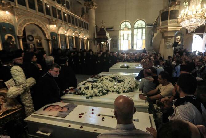 Mourners gather during the funeral of those killed in a suicide attack two days ago, at the Church of Holy Cross in Damascus’ Al-Qassaa neighborhood, on Jun. 24, 2025. (AFP)