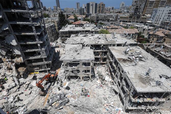 Damaged buildings in Bat Yam, Israel, on June 15. (Reuters)