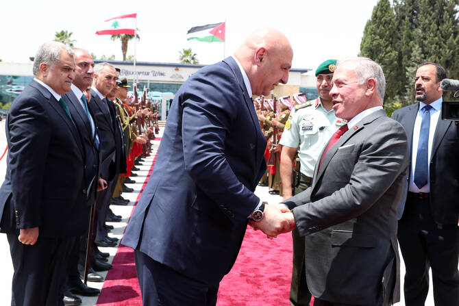 King Abdullah of Jordan greets Lebanese President Joseph Aoun in Amman on Tuesday. (Supplied)