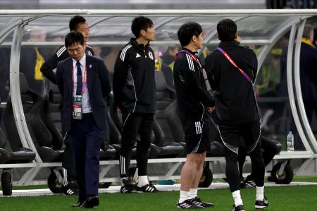 Reuters Japan's Head Coach Hajime Moriyasu (left) reacts after the loss during the 2026 FIFA World Cup Asian Qualifier football match against Australia at Optus Stadium in Perth on June 5, 2025. (AFP)
