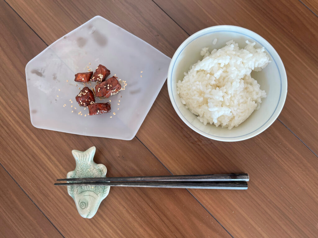A plate of tuna tsukudani, served with hot rice, appears in the Tsukuda neighborhood. (AP)