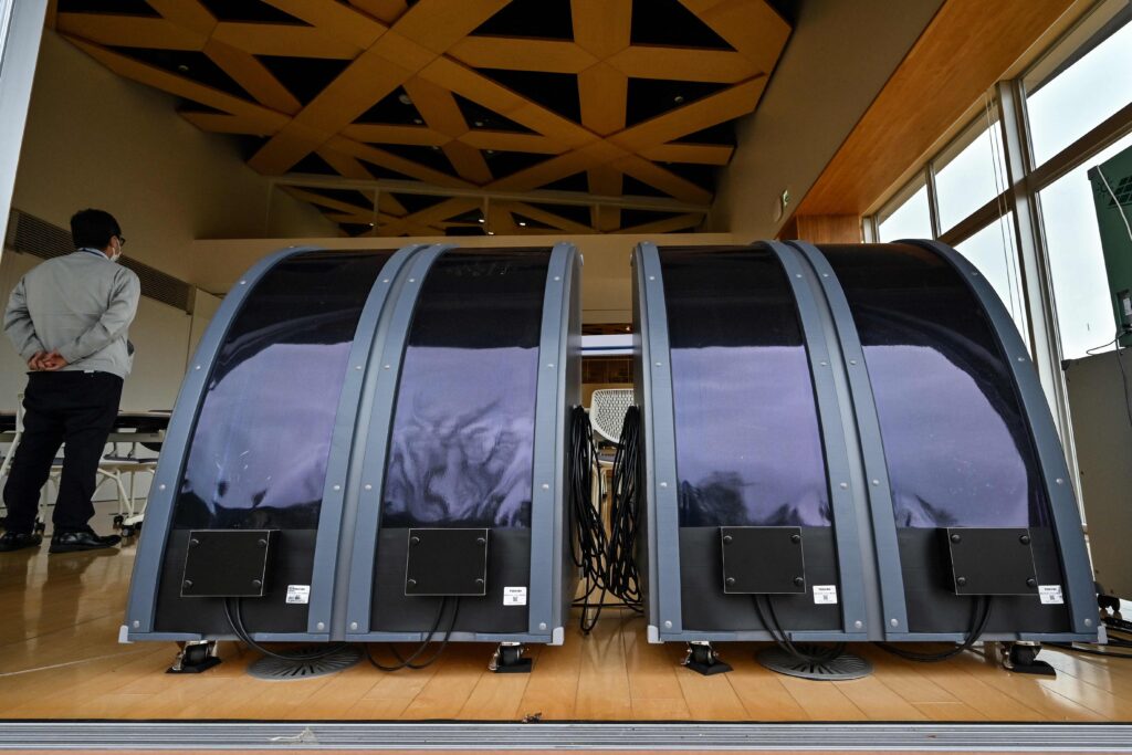 Perovskite solar panels on display at the Okuma Town Hall in Okuma, Fukushima prefecture, an area of the town recently rebuilt just a few kilometres west of the stricken Fukushima Daiichi nuclear power plant. (AFP)
