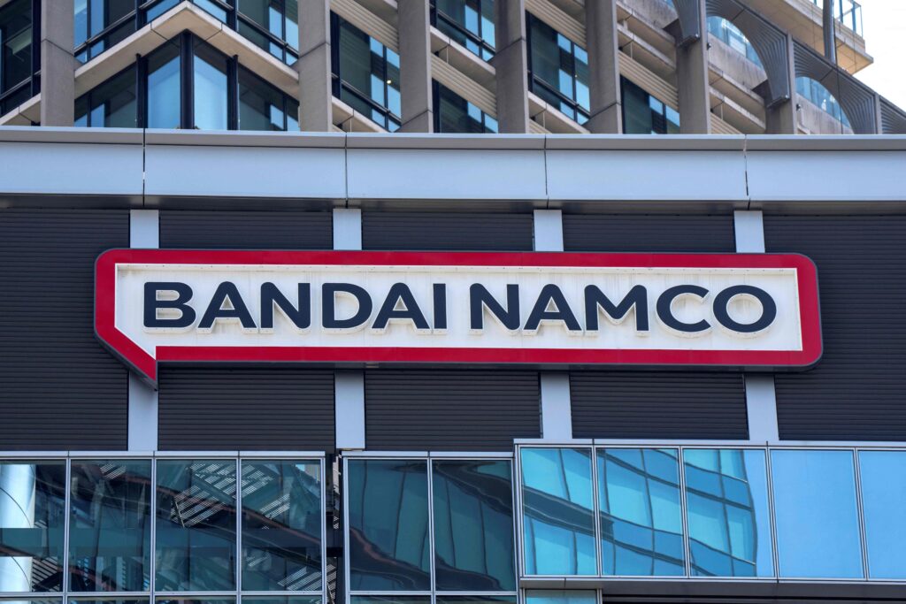 The logo of Japanese video game publisher Bandai Namco is displayed at the company's head office in Tokyo on July 25, 2025. (AFP)