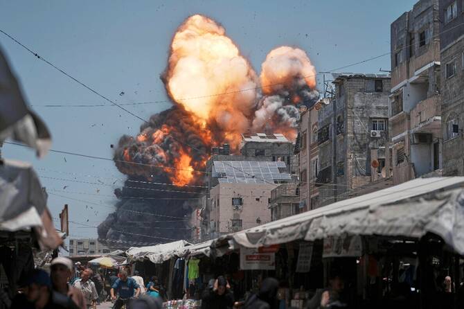 Fire and smoke seen from an Israeli airstrike in Gaza City. (AP)