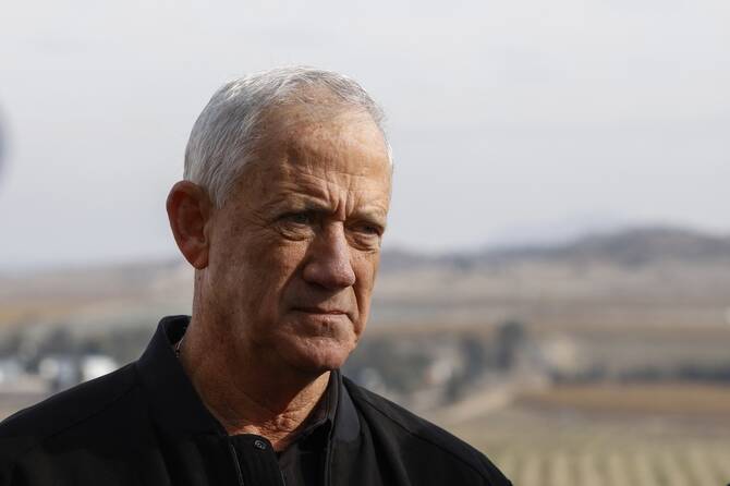 Israeli politician Benny Gantz talks to reporters as he visits an area across from Syrian territories in the Israel-annexed Golan heights on December 8, 2024. (File/AFP)
