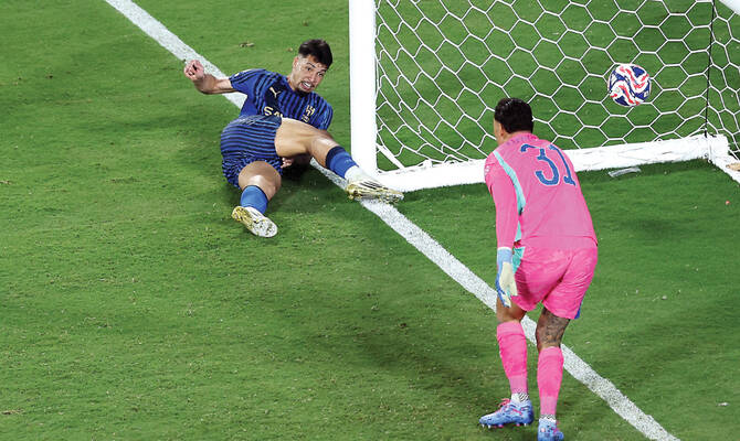 Marcos Leonardo of Al-Hilal scores his team’s fourth goal past Ederson of Manchester City during the sides’ Club World Cup round of 16 match. (AFP)