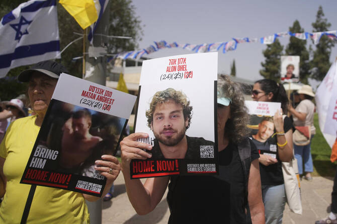 Relatives and supporters of hostages held by Hamas in the Gaza Strip protest outside the prime minister's office in Jerusalem on Tuesday, July 1, 2025. (AP)