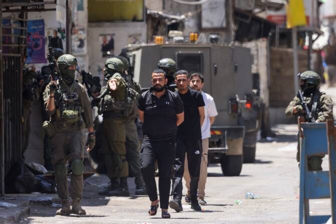 Human rights groups accuse Israel of using settler attacks on Palestinians as an informal tool for land appropriation, with official support and military backing. (AFP)