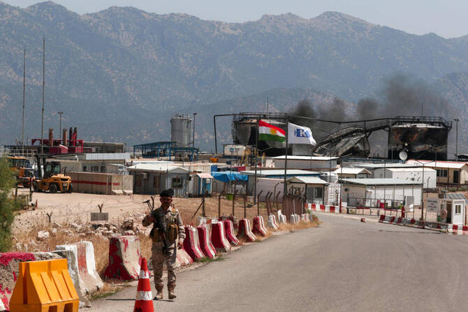 Smoke billows from a damaged oil installation at the Sarsang oil field, following a drone attack on July 17, 2025 on the Chamanke district near the Kurdish city of Dohuk in northern Iraq's autonomous Kurdish region. (AFP)