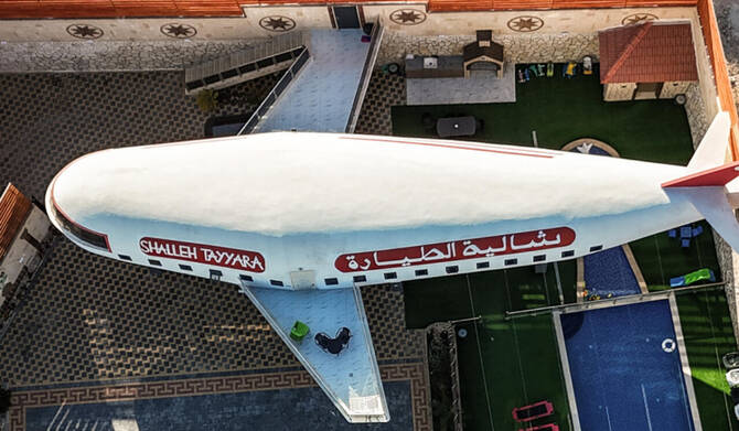 A guest house built in the shape of an aeroplane in the town of Qaffin, occupied West Bank. (AFP)