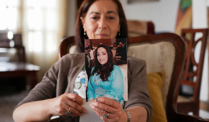 Tunisian activist Cherifa Riahi's mother Farida holds a picture of her daughter, Cherifa, at her house in Tunis, Tunisia May 11, 2025. (REUTERS)