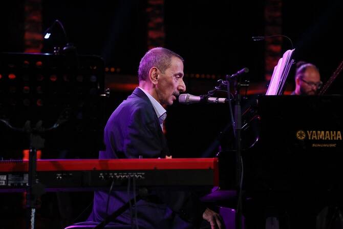 Lebanese composer and playwright Ziad Rahbani performs during the opening of the 55th session of the International Hammamet Festival at the theater of Hammamet on August 02, 2019. (AFP)