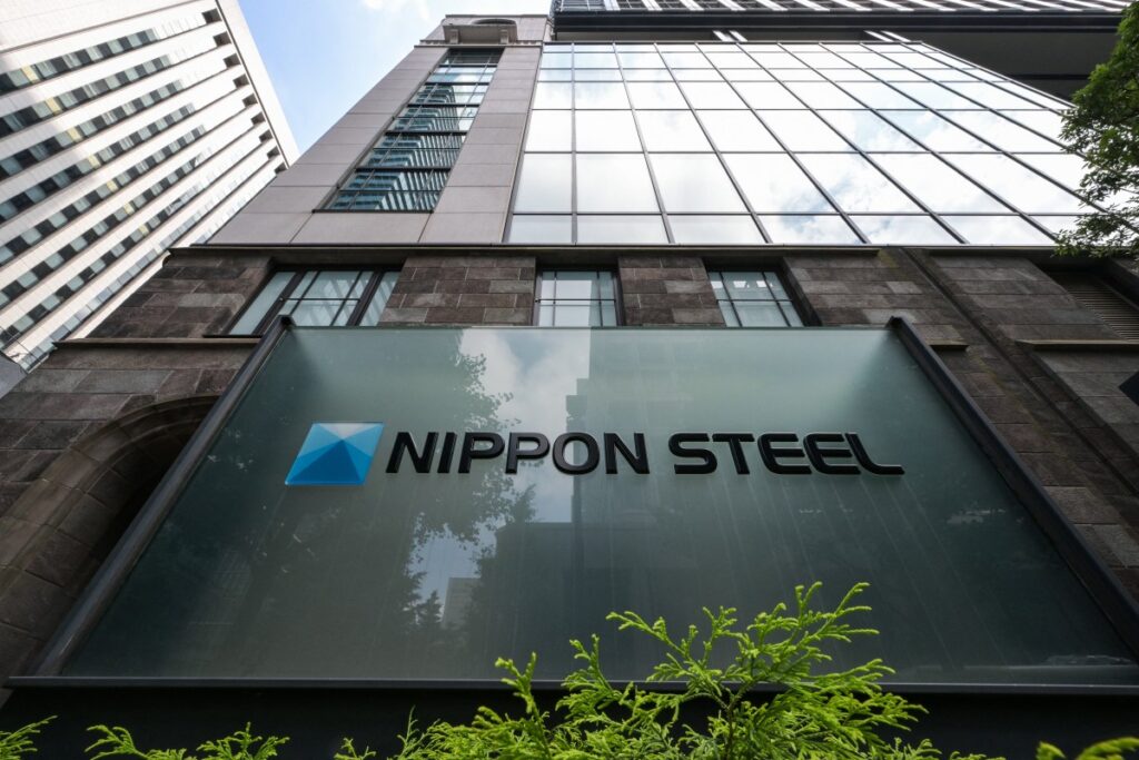 Signage showing the logo of Japan's largest steel manufacturer Nippon Steel is pictured in front of the company's head offices in central Tokyo on June 16, 2025. (AFP)