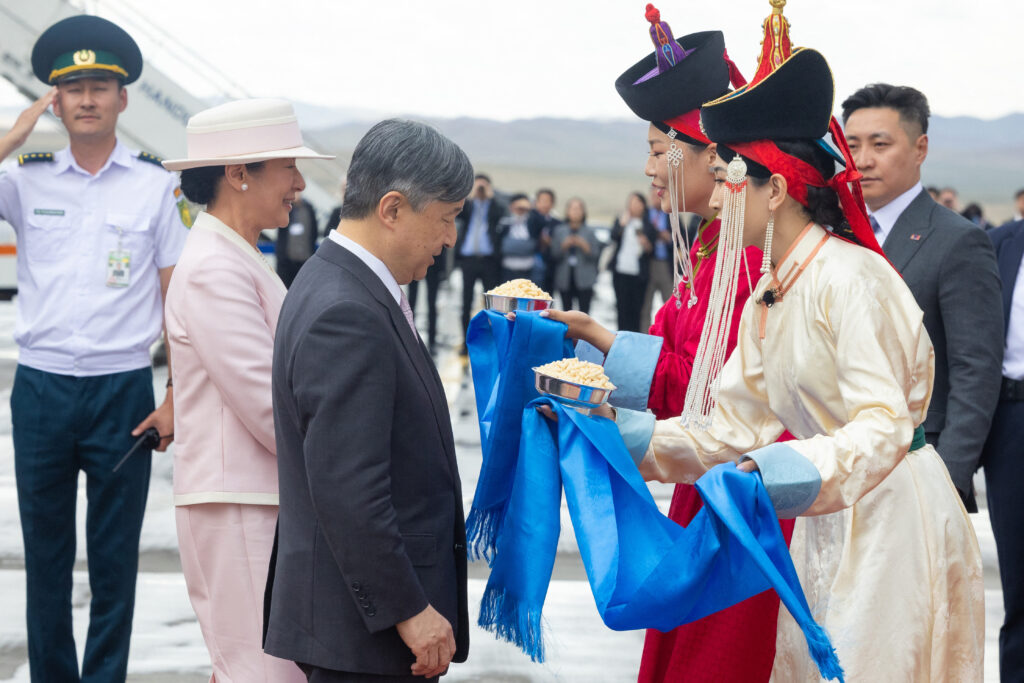 Japan's Emperor Naruhito and Empress Masako receive a traditional welcome at the airport in Ulaanbaatar, the capital of Mongolia on July 6. (AFP)