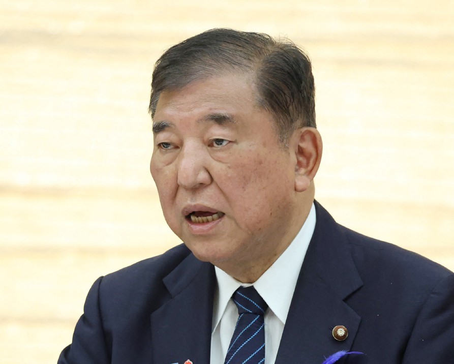 Japan's Prime Minister ISHIBA Shigeru speaks at the headquarters for comprehensive countermeasures against US tariff measures at the prime minister's office in Tokyo on July 8, 2025. (AFP)