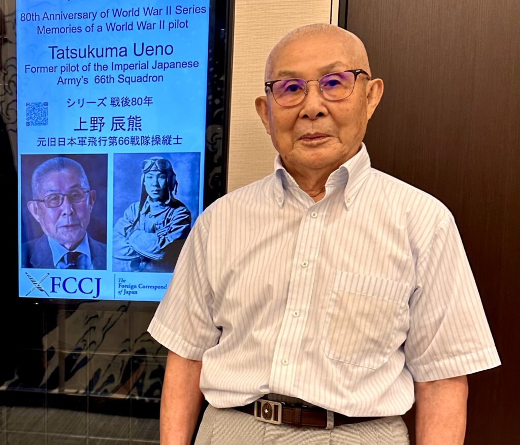 Japanese WWII pilot, UENO Tatsukuma, displays his name card to Arab News Japan Correspondent before his press conference on July 8. The card has the print of the plane he piloted during the war more than 80 years ago. (ANJ photo)