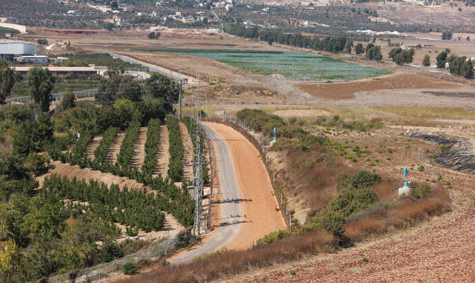 A view shows the border wall between Lebanon and Israel as pictured from Kfar Kila village, southern Lebanon. (Reuters)