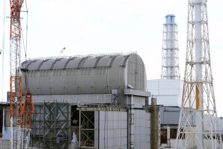 The Unit 3 reactor covered with protective housing at the Fukushima Daiichi nuclear power plant, run by Tokyo Electric Power Company Holdings (TEPCO), is seen in Okuma town, northeastern Japan on Monday Feb. 20, 2025. (AP)