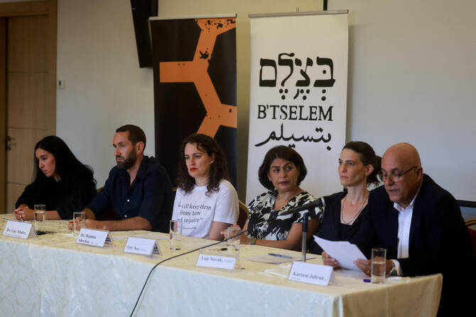 Israeli human rights groups hold a press conference to issue a report saying Israel is committing a genocide in Gaza, in occupied East Jerusalem, July 28, 2025. (Reuters)