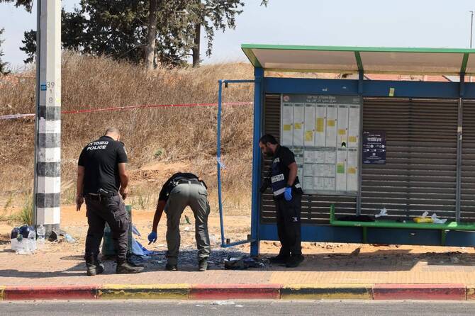 Israeli police conduct a search at the site of a reported ramming attack in the central Israeli city of Kfar Yona on July 24, 2025. (AFP)