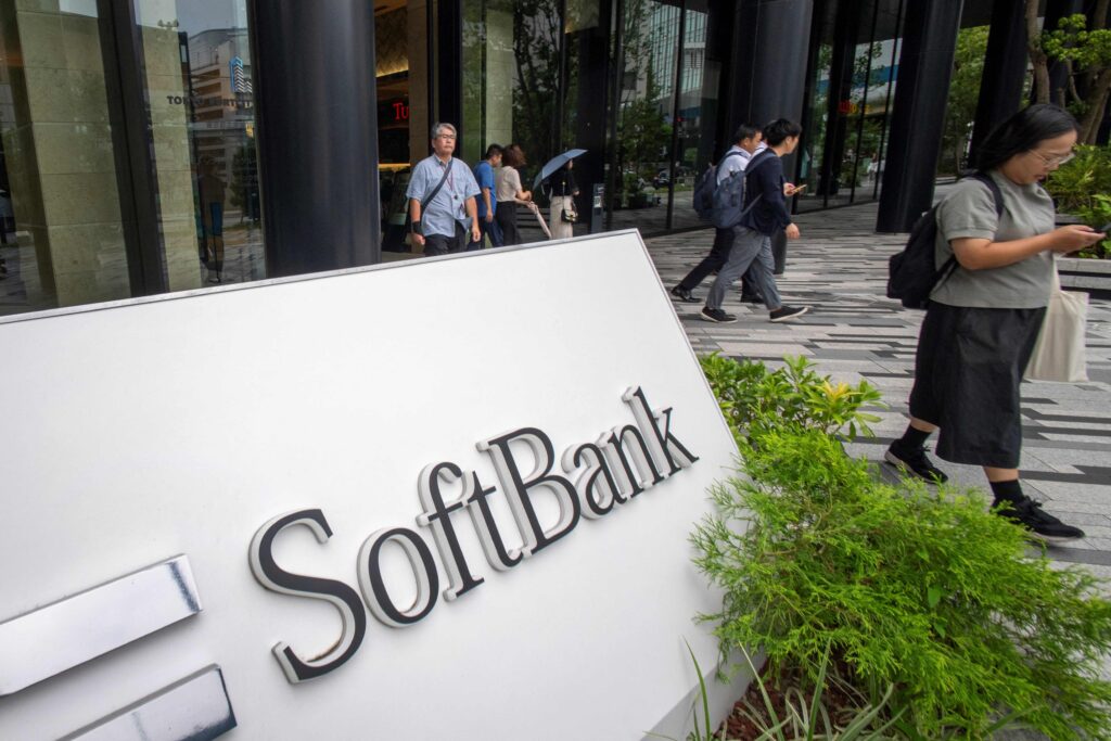 The logo of Japan's Softbank Group is displayed the company's head office in Tokyo on August 7, 2025. (AFP)