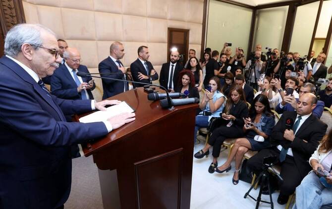 Lebanon’s PM Nawaf Salam speaks to the press after a cabinet session to discuss the issue of disarming Hezbollah at the Presidential Palace in Baabda, east of Beirut, Aug. 5, 2025. (AFP)
