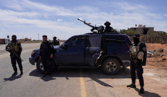 Members of Syrian security forces stand guard after being deployed in the village of Al-Soura al-Kubra, following clashes between Sunni Islamist militants and Druze fighters, in Sweida province, Syria, May 2, 2025. (REUTERS)