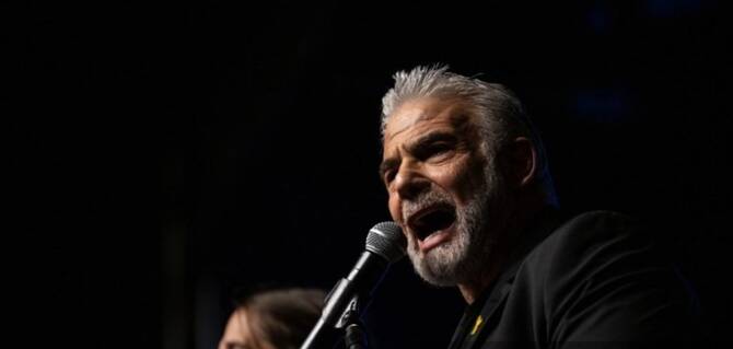 Leader of the opposition centrist Yesh Atid party Yair Lapid speaks at a protest in Tel Aviv, Israel. (AFP)